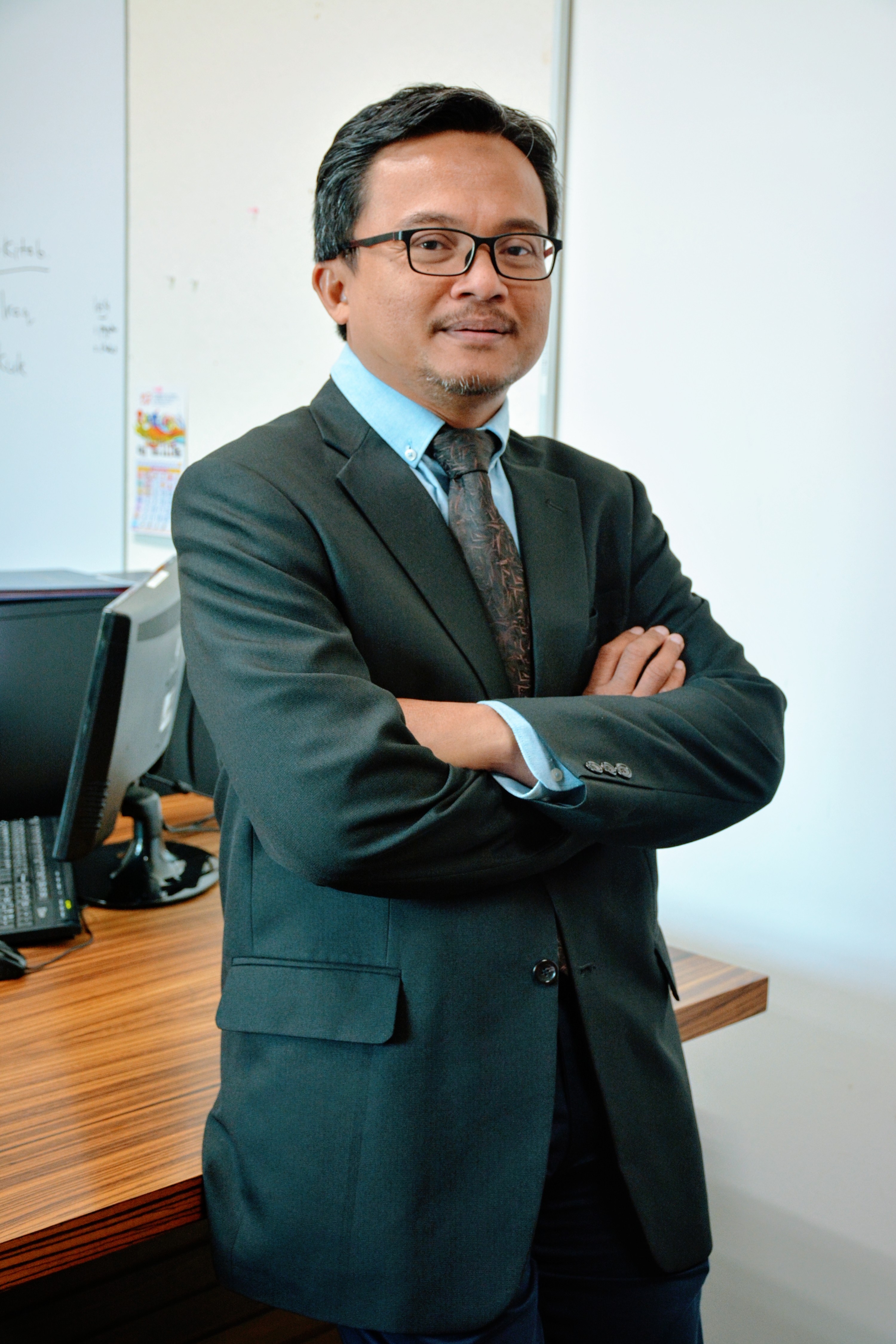 Associate Professor Dr. Mohd Kamal Mohd Nawawi